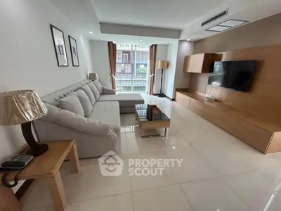 Spacious modern living room with elegant furniture and natural light