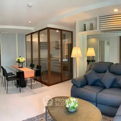 Modern living room with open layout and stylish furniture in a contemporary apartment.