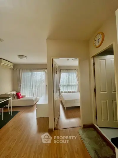 Cozy apartment interior with wooden flooring and natural light