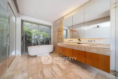 Luxurious modern bathroom with freestanding tub and elegant vanity