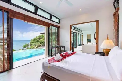 Luxurious bedroom with stunning ocean view and private pool access