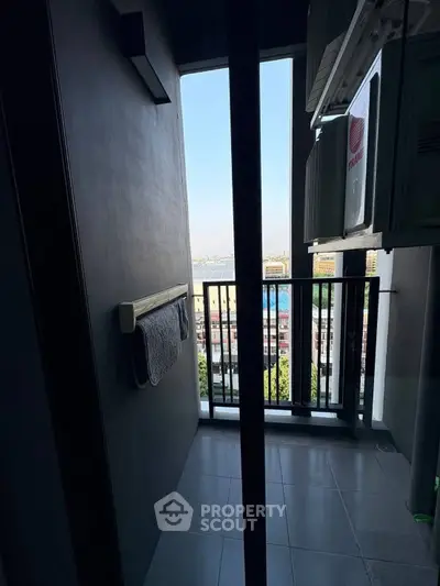 Modern balcony with city view and sleek design, perfect for urban living.