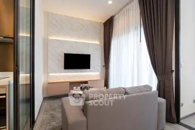 Modern living room with sleek design and natural light