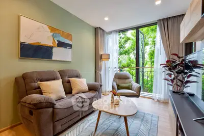 Cozy living room with modern decor and lush garden view