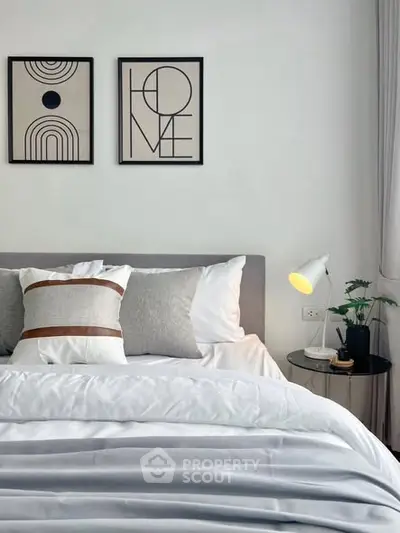 Modern bedroom with stylish decor and cozy ambiance