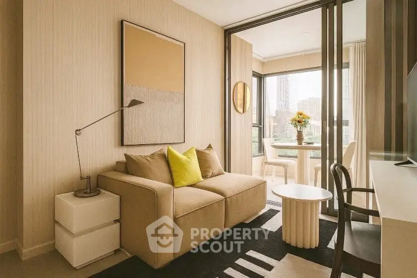 Stylish living room with modern decor and city view, featuring cozy sofa and elegant furnishings.