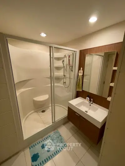 Modern bathroom with sleek shower and stylish vanity unit