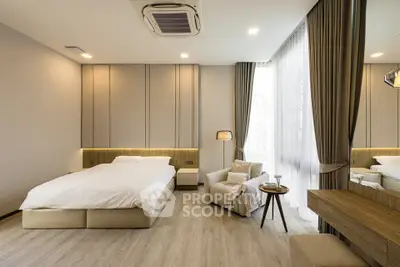 Luxurious modern bedroom with elegant decor and natural light