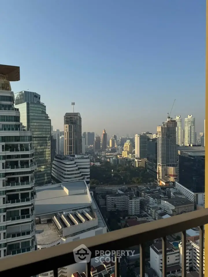 Stunning cityscape view from high-rise balcony in urban skyline