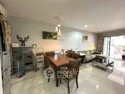 Spacious living room with elegant dining area and modern decor
