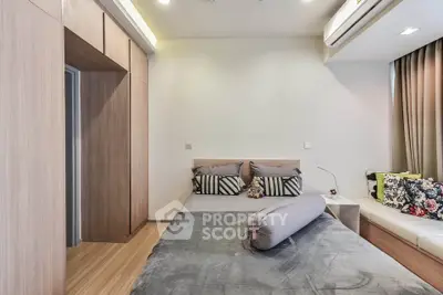 Modern bedroom with stylish decor and cozy ambiance