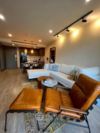 Stylish open-layout living room with modern furniture and cozy ambiance