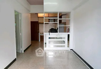 Spacious open-plan living area with modern design and ample natural light.