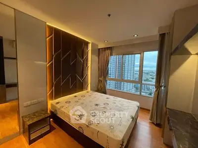 Modern bedroom with large window and city view, featuring stylish decor and cozy ambiance.