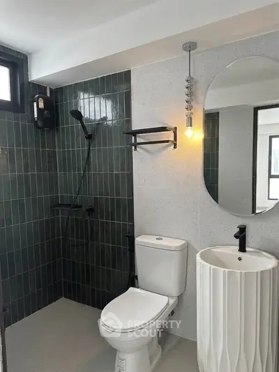 Modern bathroom with sleek fixtures and stylish tile design
