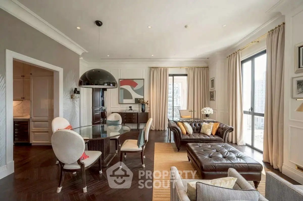 Luxurious living room with elegant decor and city view, featuring a stylish dining area and comfortable seating.