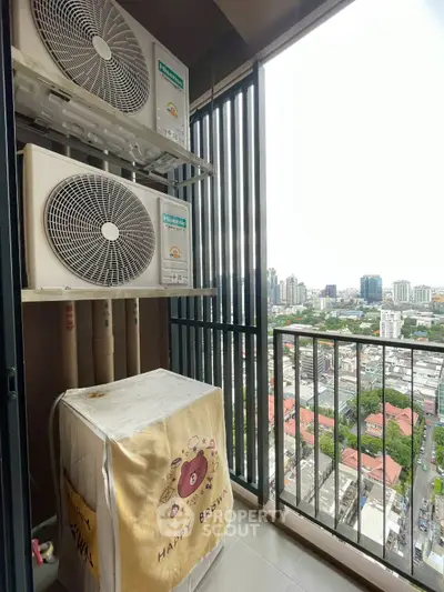 High-rise balcony with city view and air conditioning units, perfect for urban living.