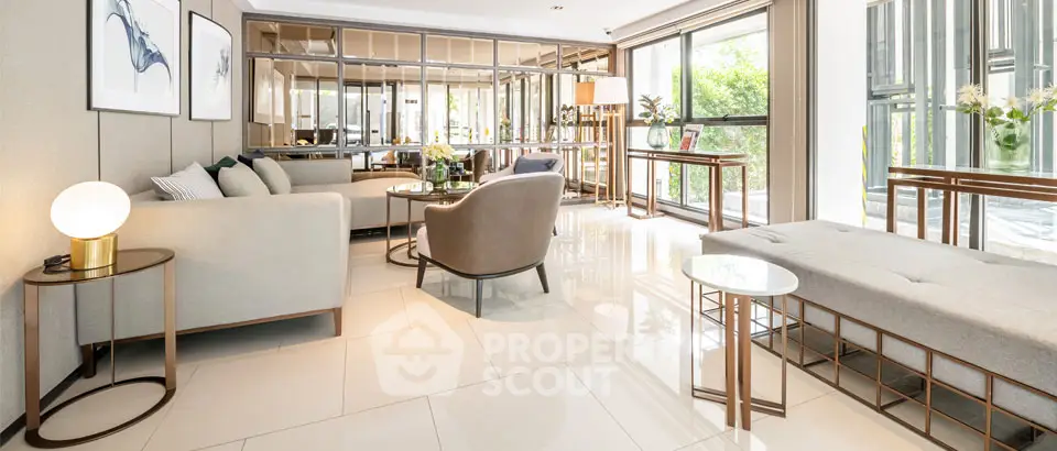 Spacious modern living room with elegant decor and large windows.