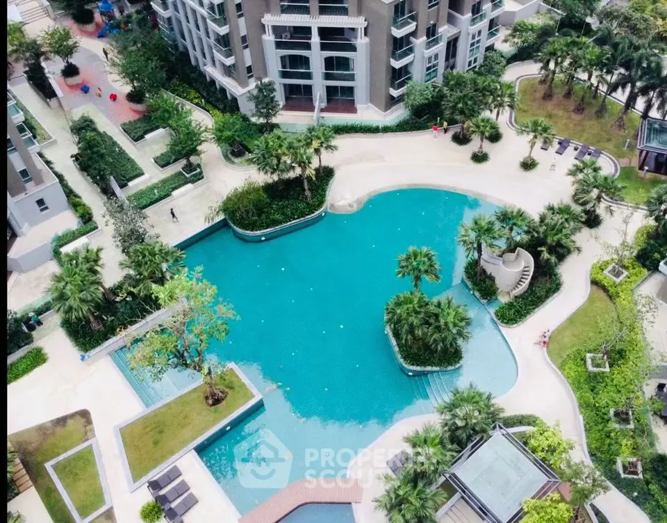 Luxurious residential complex with stunning pool and lush gardens