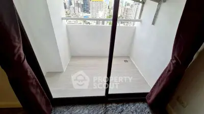 Spacious balcony with city view in modern apartment