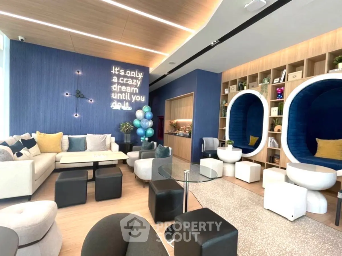 Modern living room with stylish decor and unique seating areas, perfect for relaxation and entertainment.