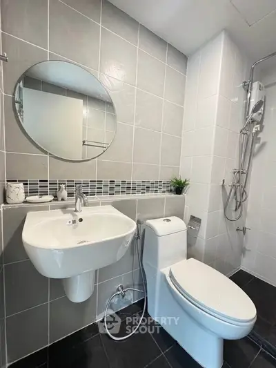 Modern bathroom with sleek fixtures and stylish tile design
