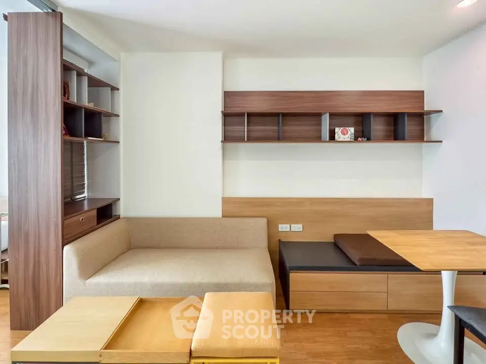 Modern living room with stylish wooden shelves and cozy seating area