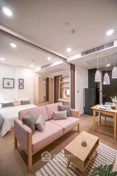 Modern open-plan living room with stylish decor and cozy ambiance