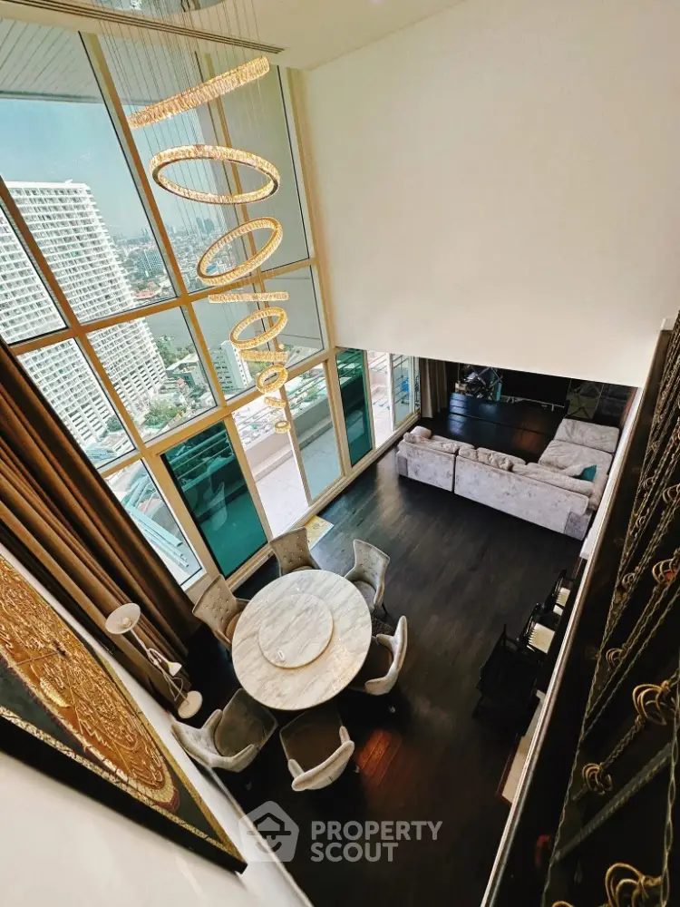 Luxurious high-rise living room with stunning city view and elegant decor