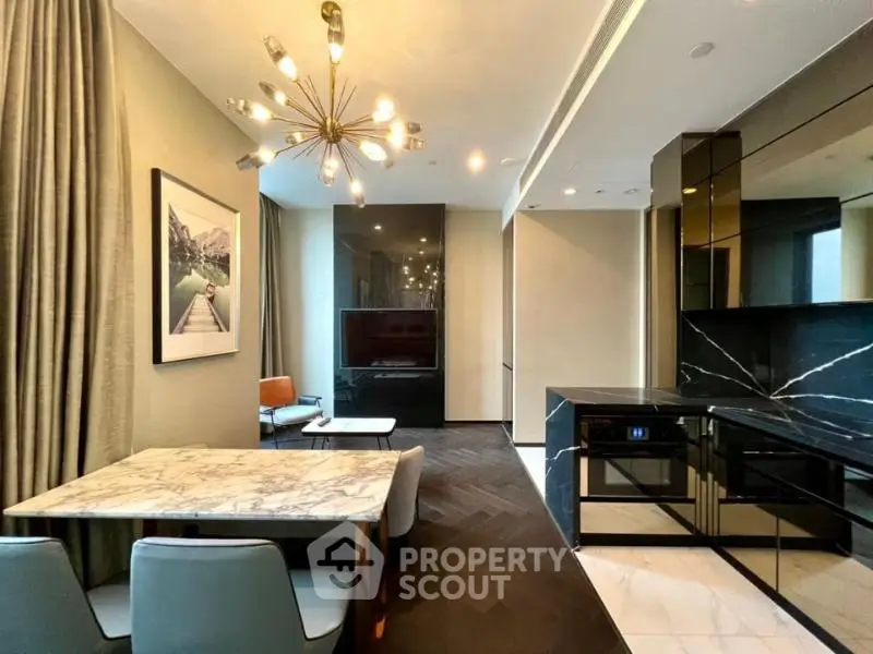 Luxurious modern living room with elegant dining area and sleek kitchen design.