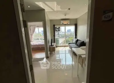 Modern apartment with open living room and balcony view