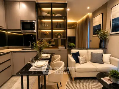 Luxurious modern living room with open kitchen, elegant decor, and ambient lighting.