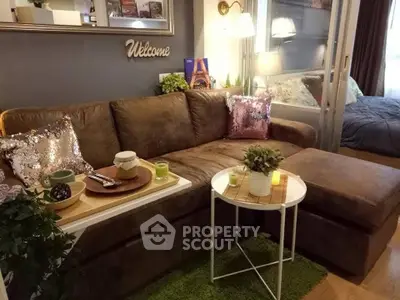 Cozy living room with plush brown sofa and stylish decor in modern apartment