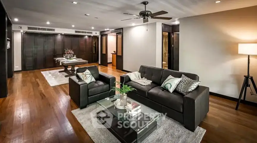 Spacious modern living room with elegant decor and hardwood floors