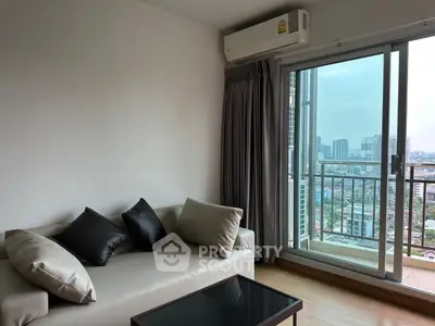 Modern living room with city view balcony and sleek furnishings