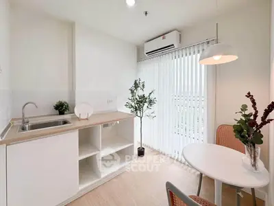 Modern minimalist kitchen with open layout and natural light