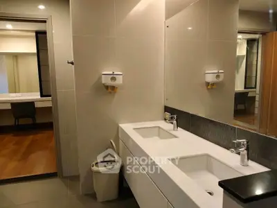 Modern bathroom with dual sinks and sleek design