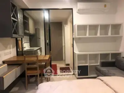 Cozy studio apartment with modern kitchen and open layout