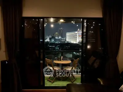 Charming balcony with city view, perfect for evening relaxation.