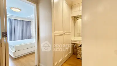 Spacious bedroom with elegant built-in wardrobe and cozy ambiance