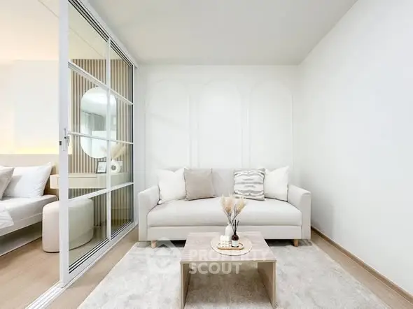 Modern living room with cozy sofa and elegant decor in a bright apartment.