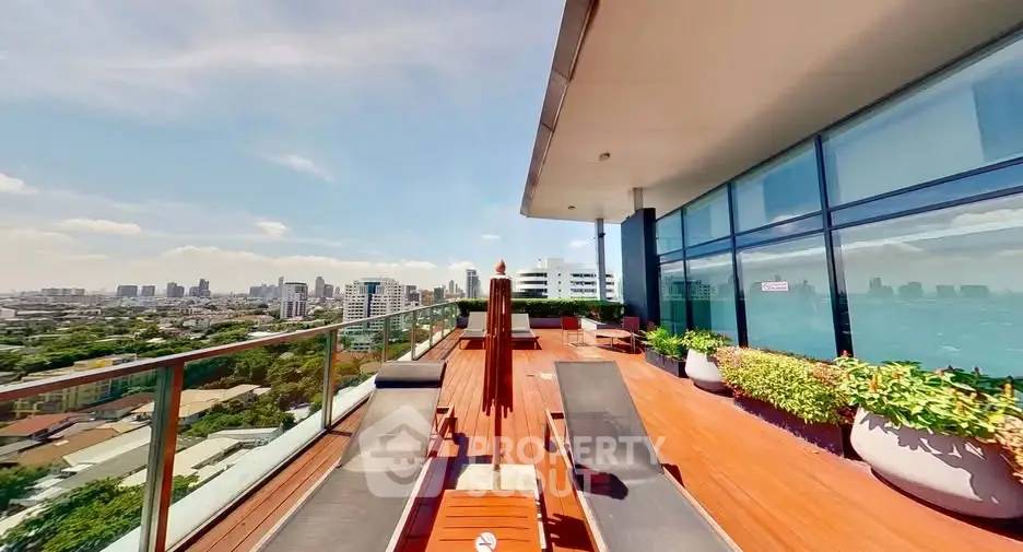 Luxurious rooftop terrace with stunning city views and modern outdoor seating.