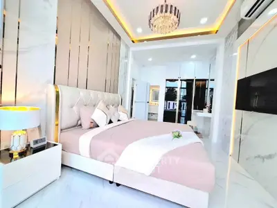 Luxurious bedroom with elegant decor and modern lighting
