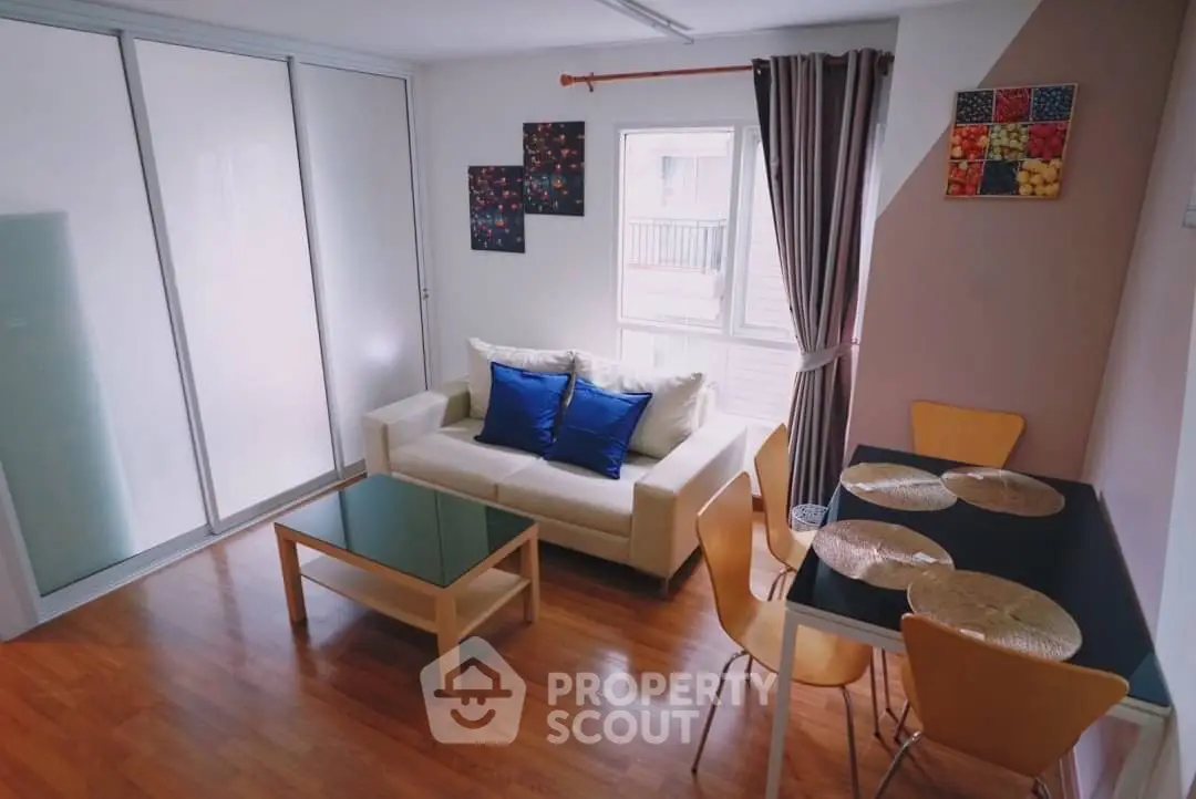 Charming living room with modern decor and natural light, perfect for relaxation and entertaining.