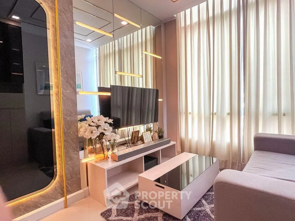 Modern living room with elegant decor, large windows, and stylish furniture, perfect for relaxation and entertainment.