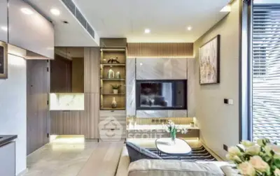 Luxurious modern living room with elegant decor and built-in entertainment center