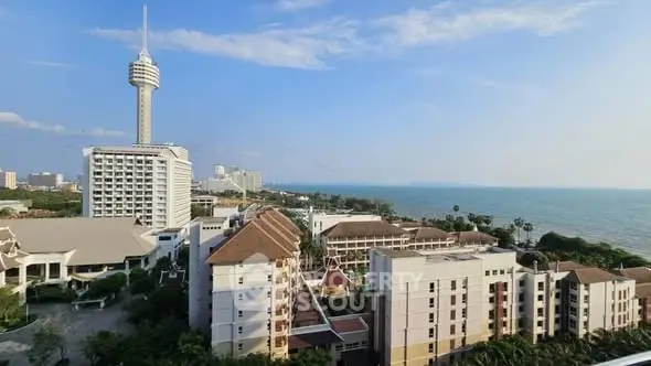 Stunning coastal view with modern buildings and ocean backdrop