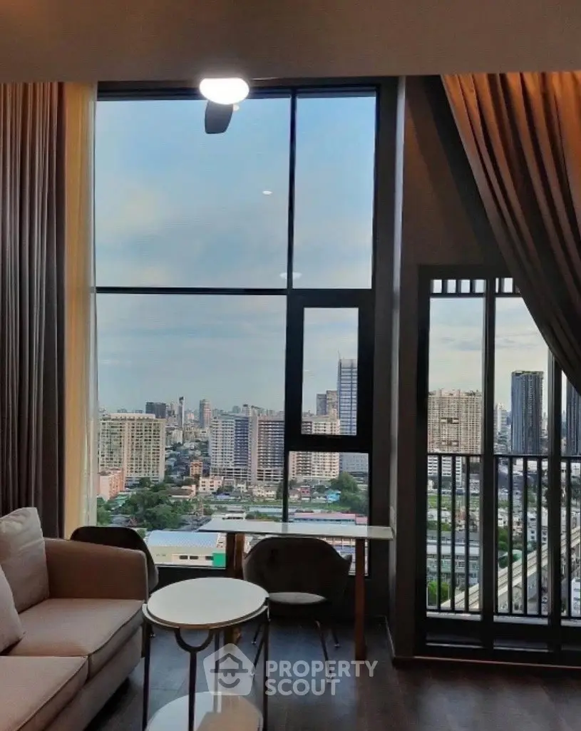 Luxurious living room with stunning city view and elegant decor