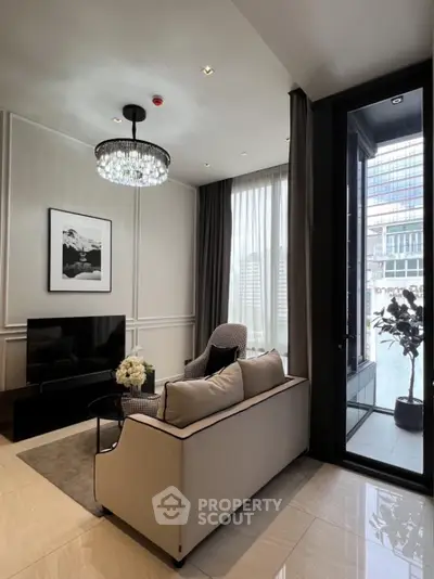 Luxurious living room with elegant decor and large windows offering city views.