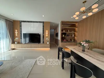Luxurious modern living room with elegant dining area and stylish decor
